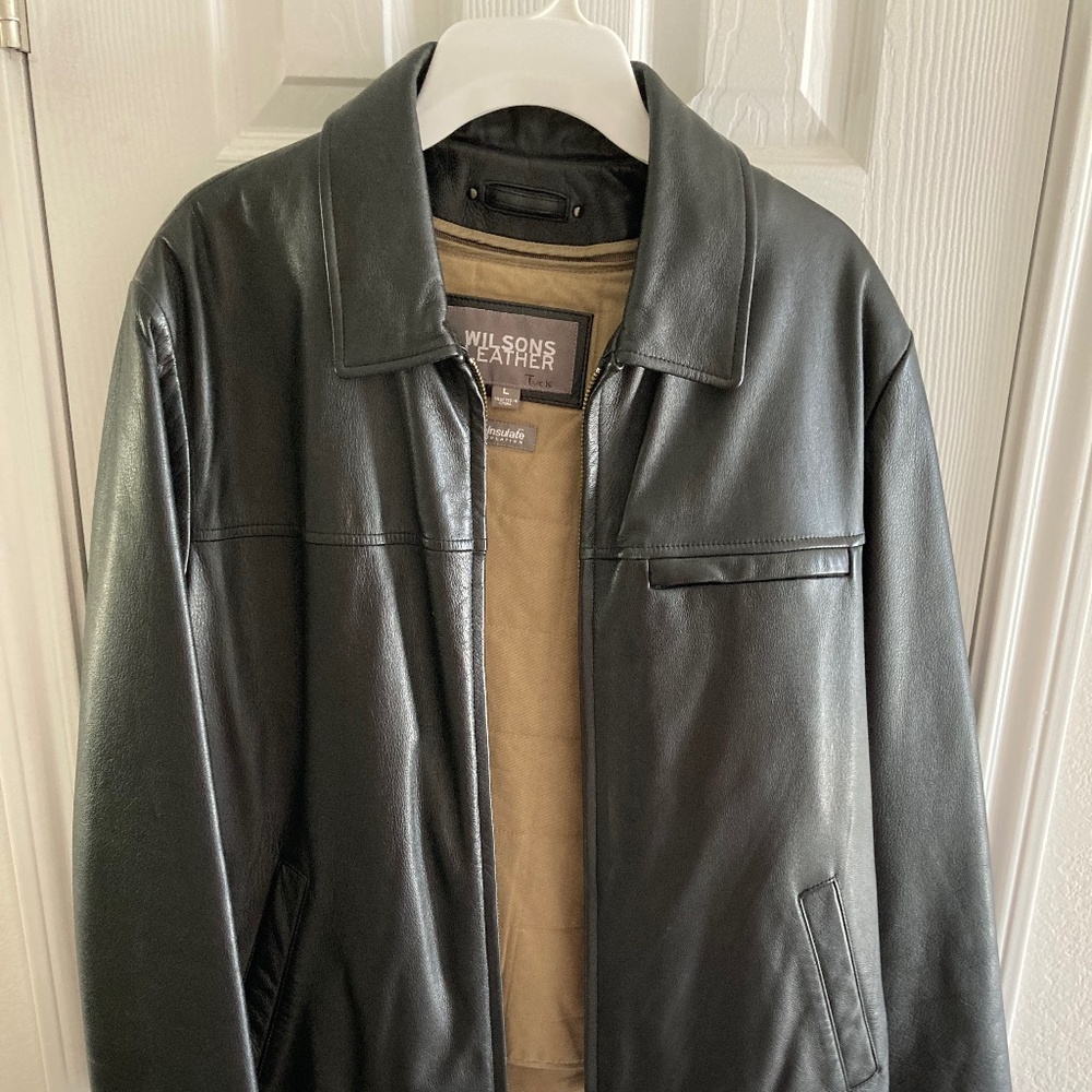 Wilson’s black leather jacket.